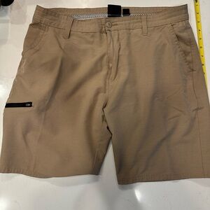 Men’s 20” Khaki Burnside Hybrid Shorts, size 34.